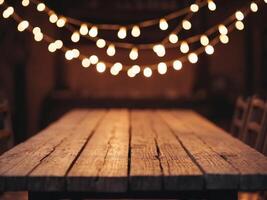 Rustic Wooden Table with String Lights Background. photo