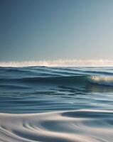 Tranquil Deep Blue Ocean Waves with Gentle Ripples and Soft Light Reflections photo