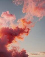 Colorful smoke blending with warm light during sunset creates a dreamy atmosphere photo