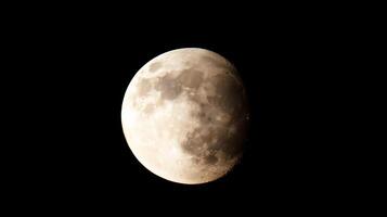 A close-up view of the moon showcasing its surface details. photo