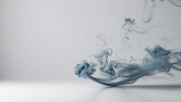 A blue and white image of a cloud of smoke. photo