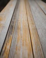 a close up of a wooden surface with a very long line of lines. photo