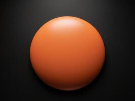 A black background with a large orange circle in the center. photo
