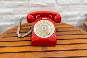 Old telephone on white background. Shallow depth of field. photo