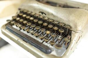 Old typewriter, close-up, shallow depth of field. photo
