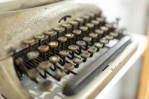 Old typewriter, close-up, shallow depth of field. photo