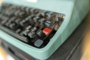 Old typewriter, close-up, shallow depth of field. photo