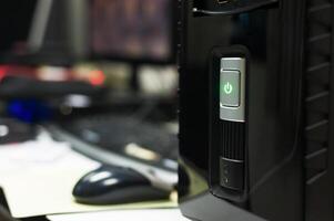 Power computer button in soft light photo