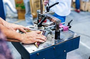 Man made picture frame with machine framer photo