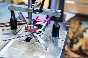Man made picture frame with machine framer photo