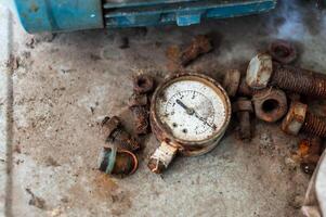 Old meter in dirty place . photo