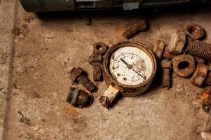 Old meter in dirty place . photo