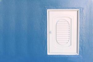 White window on wall in soft light photo