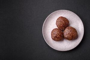 Beef burger patties with salt, spices and herbs photo