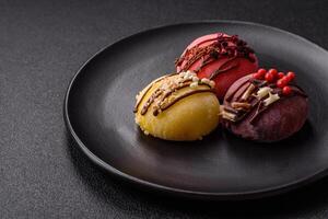 Delicious colorful asian mochi sweets with rice dough shell and fruit filling photo