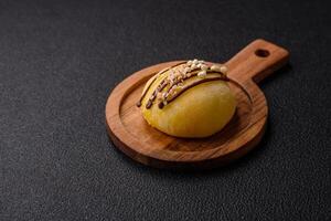 Delicious colorful asian mochi sweets with rice dough shell and fruit filling photo