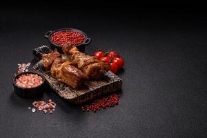 Delicious grilled chicken, turkey or pork skewers with salt, spices and herbs photo