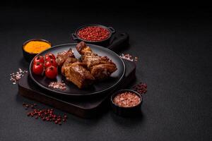 Delicious grilled chicken, turkey or pork skewers with salt, spices and herbs photo