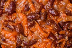 Vegan or vegetarian stew with red beans, onions and carrots or lobio photo