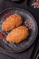 Delicious fresh cutlet or meatball Kiev style with filling photo