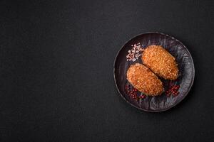 Delicious fresh cutlet or meatball Kiev style with filling photo