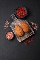 Delicious fresh cutlet or meatball Kiev style with filling photo