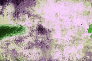 Rough grungy texture in purple and green tones with uneven patterns, ideal for backgrounds, design, or artistic concepts. photo