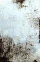 Weathered white and brown grunge texture with stains, rough patches, and aged patterns for creative backgrounds. photo