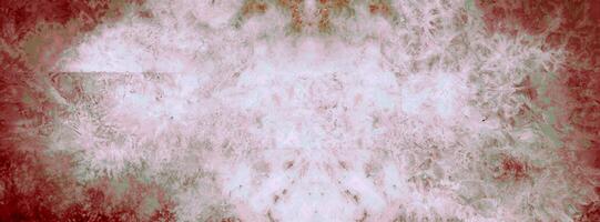 Abstract symmetrical texture with red and white tones, featuring a distressed and cloudy design, ideal for backgrounds. photo