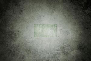 Dark grunge texture with subtle green tones, ideal for backgrounds, overlays, or artistic design projects. photo