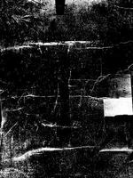 Rough black and white grunge texture featuring wrinkles, creases, and distressed effects, ideal for artistic backgrounds. photo