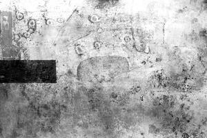 A gritty, weathered surface with scratches, stains, and textured marks, perfect for artistic overlays or design backgrounds. photo
