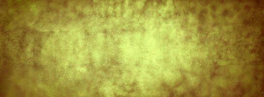 Rustic yellow cracked texture background with a subtle gradient, ideal for design projects, art, and presentations. photo