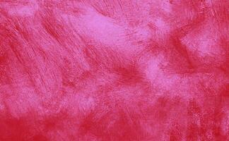 Bright red abstract background with textured brush strokes, ideal for design and artistic projects. photo