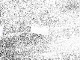 High-contrast black-and-white abstract texture with a grainy noise effect, ideal for overlays or creative backgrounds. photo