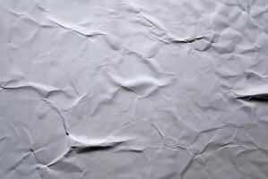 Crumpled white paper texture with soft shadows, creating a minimalistic and natural design element for backgrounds. photo
