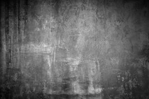 Abstract dark concrete texture with subtle streaks and grunge patterns, ideal for backgrounds or industrial-themed designs. photo