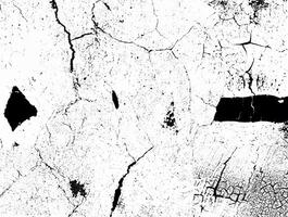 Rough grunge texture with prominent black cracks and patterns on a white background, ideal for overlays or design elements. photo