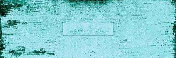 Teal grunge texture with distressed and weathered patterns, suitable for backgrounds, overlays, or artistic design. photo