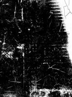 Abstract black and white texture featuring distressed patterns, scratches, and cracks, perfect for design overlays. photo