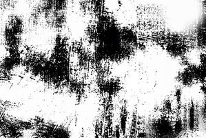 Distressed black and white grunge texture with abstract patterns, suitable for backgrounds or overlays in design. photo