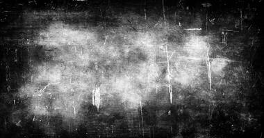 Abstract grunge black and white texture background with scratches, distressed patterns, and vintage appearance. photo