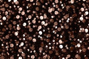 Abstract texture background with sequins. Color of the Year 2025 Mocha Mousse color. Chocolate or Brown Background photo