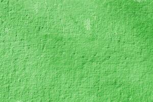 Texture of rough green plaster. Architectural abstract background. photo