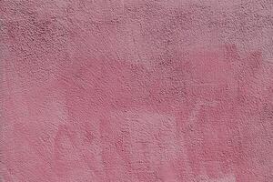 Pink plaster texture. Abstract construction design background. photo