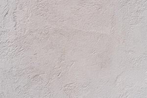 Texture of an old white plastered wall. Abstract construction background. photo