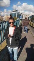 Exploring Fashionable Street Style in a Dynamic Urban Setting with Vibrant Colors and Accessories video