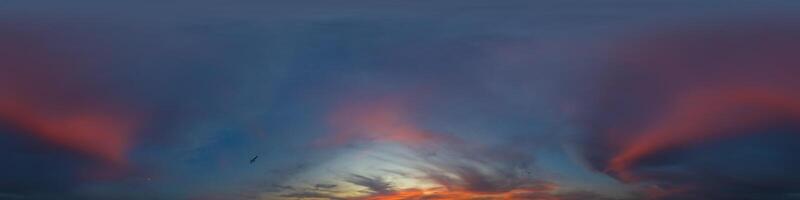 Panorama of a dark blue evening sky with pink Cumulus clouds. Seamless hdr 360 panorama in spherical equiangular format. Full zenith for 3D visualization, sky replacement for aerial drone panoramas. photo
