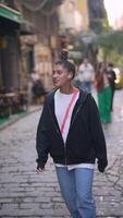 Embracing a Casual Street Style in a Bustling Urban Environment for a Trendy Look video
