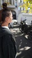 A Contemplative Moment Occurring in a Bustling Urban Setting, Filled with Life and Energy video